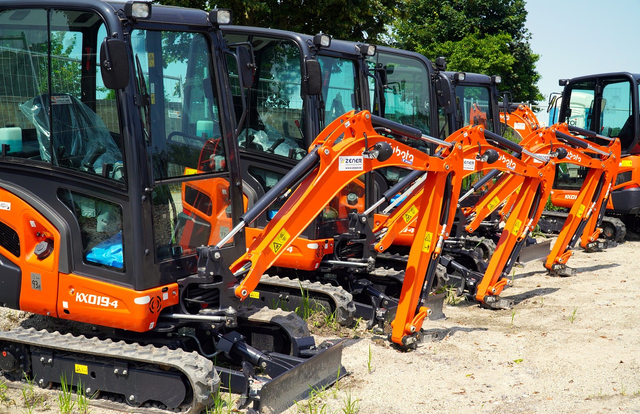 Row of Mini Excavators